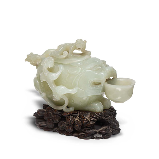 A CELADON JADE ‘MYTHICAL BEAST’ WATERDROPPER AND COVER