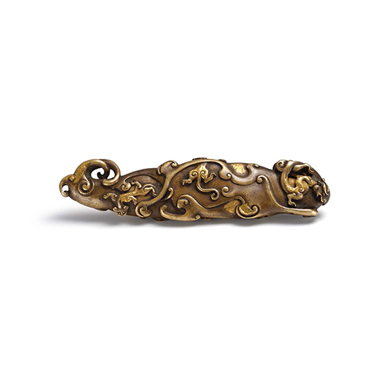 AN IMPERIAL GILT-SPLASHED BRONZE ‘CHILONG AND PHOENIX’ SCROLL WEIGHT