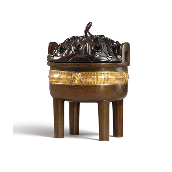 A PARCEL-GILT OVOID BRONZE CENSER AND COVER