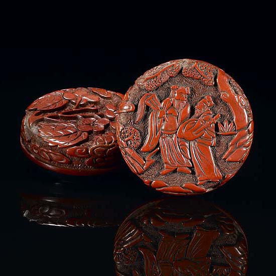 A CARVED CINNABAR LACQUER BOX AND COVER