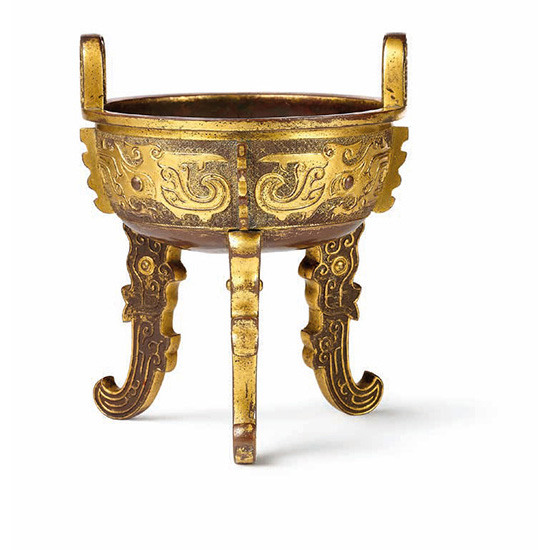 A PARCEL GILT ARCHAISTIC DING TRIPOD CENSER